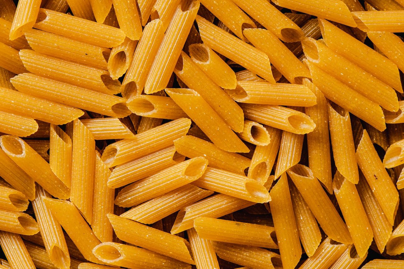 close up photograph of penne pasta